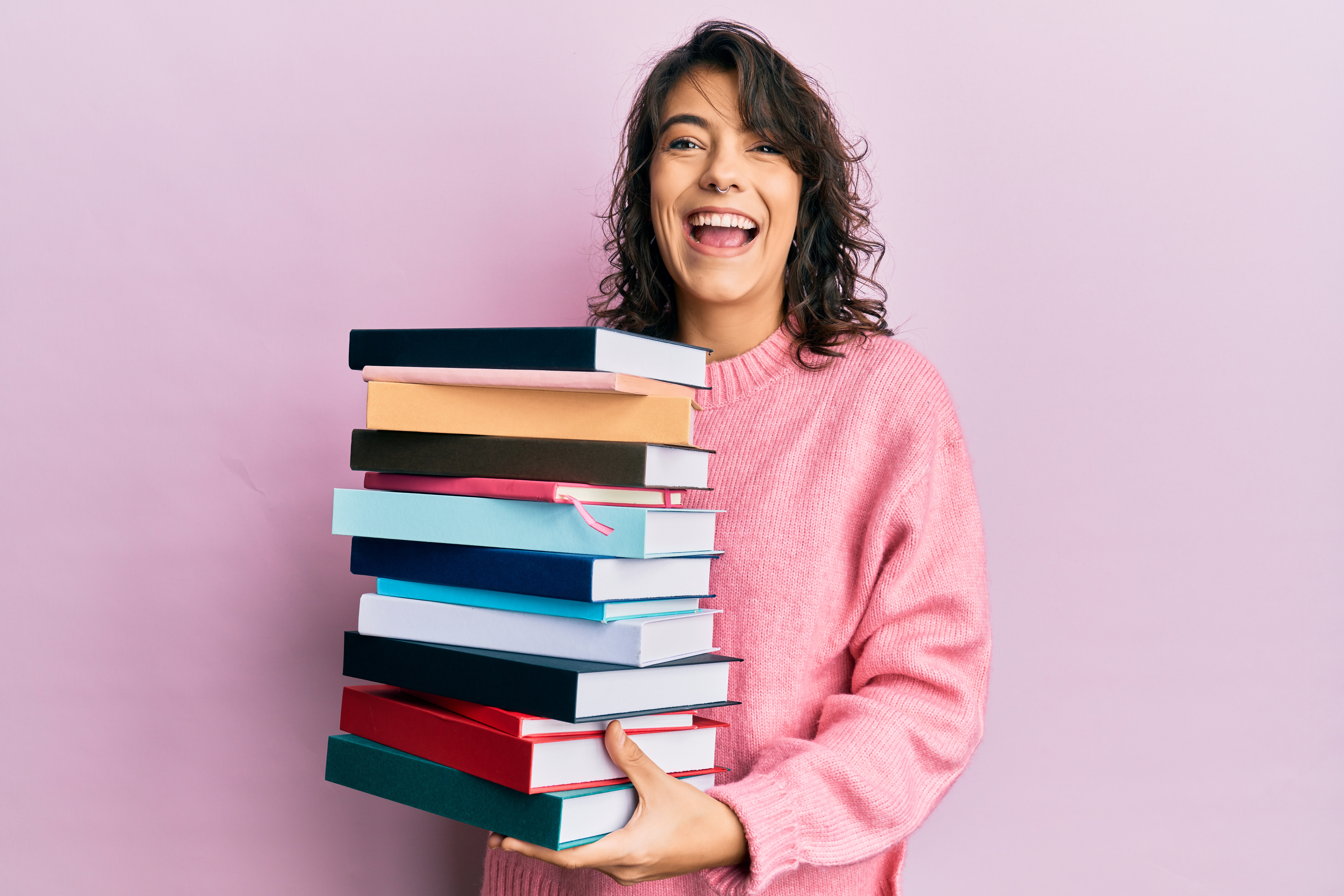 Person holding books
